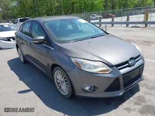 2012 Ford Focus SEL with VIN 1FAHP3H28CL282080, listed as a IAAI auction lot 42039926 with 134,785 mi miles. Bid and sale history available at carsss.com. Image 6.