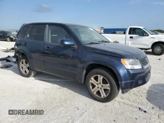 2012 Suzuki Grand Vitara Premium z VIN JS3TD0D29C4100139, wystawiony jako Copart lot #49163115 z przebiegiem 271 080 mil mil oraz Nie do naprawy. Historia ofert i sprzedaży dostępna na DreamBid. Obrazek 4.