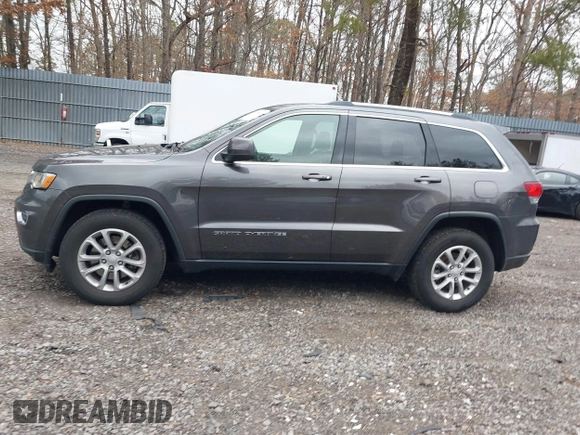 2021 Jeep Grand Cherokee Laredo X with VIN 1C4RJFAG6MC703691, listed as a IAAI auction lot 41655340 with 53,300 mi miles and . Bid and sale history available at DreamBid. Image 14.