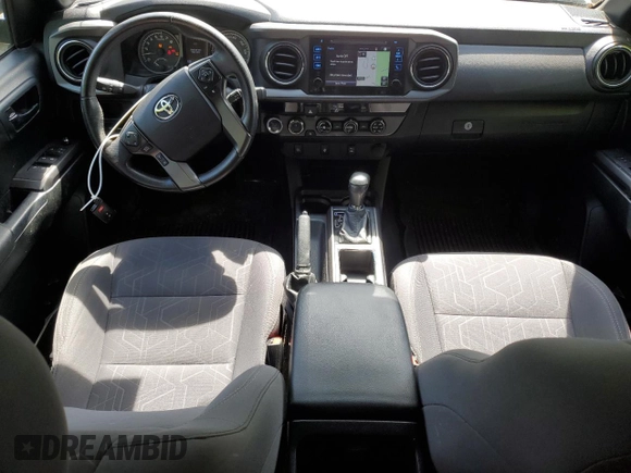 2017 Toyota Tacoma SR5 z VIN 3TMDZ5BN6HM017990, wystawiony jako Copart lot #57982205 z przebiegiem 51 890 mil mil oraz Szkoda całkowita • Salvage title. Historia ofert i sprzedaży dostępna na DreamBid. Obrazek 8.
