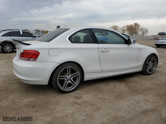 2012 BMW 1 Series 128i with VIN WBAUP7C55CVM54987, listed as a Copart auction lot 76133874 with 124,958 mi miles and Salvage Title. Bid and sale history available at carsss.com. Image 3.