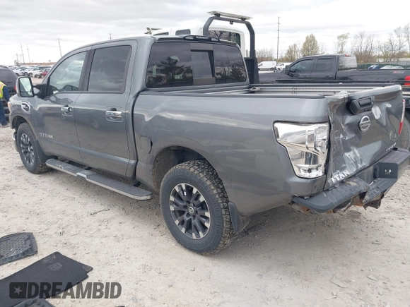 2017 Nissan Titan Platinum Reserve z VIN 1N6AA1E5XHN530256, wystawiony jako IAAI lot #42031654 z przebiegiem 97 200 mil mil oraz . Historia ofert i sprzedaży dostępna na DreamBid. Obrazek 3.