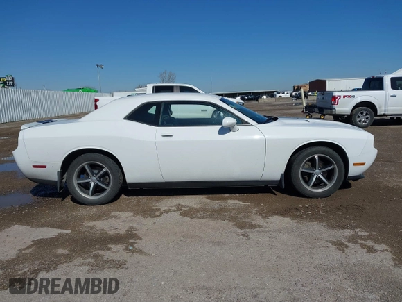 2011 Dodge Challenger z VIN 2B3CJ4DG5BH602787, wystawiony jako IAAI lot #41759684 z przebiegiem 128 055 mil mil oraz . Historia ofert i sprzedaży dostępna na DreamBid. Obrazek 13.