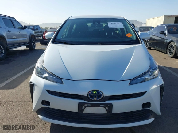 2021 Toyota Prius L Eco with VIN JTDKAMFU7M3133544, listed as a IAAI auction lot 41548653 with 115,214 mi miles. Bid and sale history available at carsss.com. Image 13.
