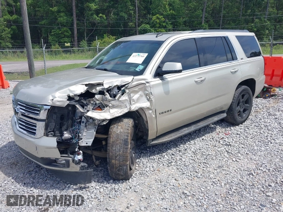 2015 Chevrolet Tahoe LT z VIN 1GNSCBKC7FR140125, wystawiony jako IAAI lot #42279760 z przebiegiem 201 335 mil mil oraz . Historia ofert i sprzedaży dostępna na DreamBid. Obrazek 17.