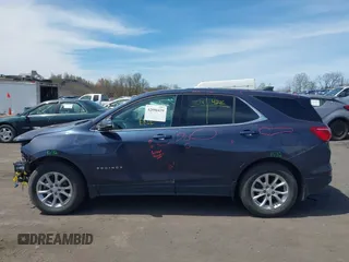2019 Chevrolet Equinox LT z VIN 3GNAXUEV8KL246366, wystawiony jako IAAI lot #42096439 z przebiegiem 87 632 mil mil oraz . Historia ofert i sprzedaży dostępna na DreamBid. Obrazek 14.