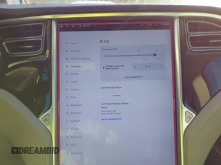 2014 Tesla Model S 60 z VIN 5YJSA1H15EFP48938, wystawiony jako IAAI lot #41574976 z przebiegiem 230 246 mil mil oraz . Historia ofert i sprzedaży dostępna na DreamBid. Obrazek 17.