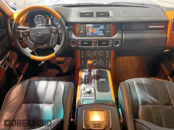 2011 Land Rover Range Rover HSE Lux с VIN SALMF1D42BA355759, выставлен на аукционе Copart как лот 63886205 с пробегом 77 618 миль миль и Списание • Salvage title. История ставок и продаж доступна на DreamBid. Изображение 9.