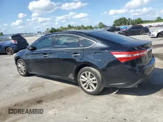 2013 Toyota Avalon XLE with VIN 4T1BK1EB2DU019243, listed as a Copart auction lot 55155725 with 256,267 mi miles and Salvage Title. Bid and sale history available at DreamBid. Image 2.
