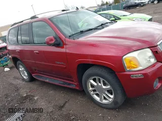 2006 GMC Envoy Denali with VIN 1GKET63M762119339, listed as a IAAI auction lot 41837443 with 192,458 mi miles. Bid and sale history available at carsss.com. Image 13.