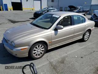2002 Jaguar X-Type 2.5L Manual z VIN SAJEA51D32XC31541, wystawiony jako Copart lot #58692745 z przebiegiem 72 201 mil mil oraz Czysty tytuł • Clean title. Historia ofert i sprzedaży dostępna na DreamBid. Obrazek 1.