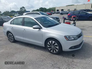 2013 Volkswagen Jetta Hybrid SEL with VIN 3VW637AJ2DM233265, listed as a IAAI auction lot 42746158 with 105,779 mi miles and . Bid and sale history available at DreamBid. Image 1.