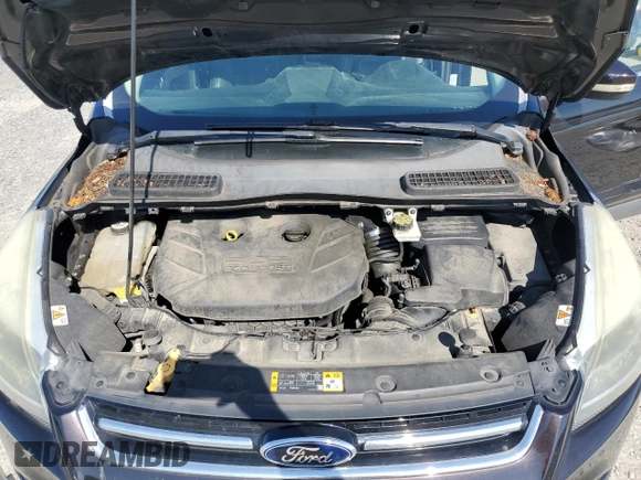 2013 Ford Escape Titanium z VIN 1FMCU0J93DUB60916, wystawiony jako Copart lot #61692595 z przebiegiem 169 691 mil mil oraz Szkoda całkowita • Salvage title. Historia ofert i sprzedaży dostępna na DreamBid. Obrazek 12.