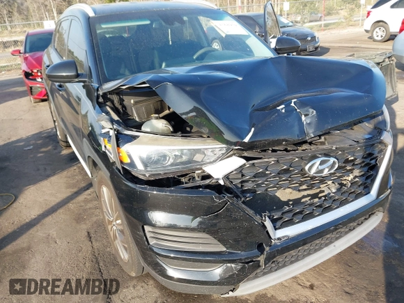 2019 Hyundai Tucson Sport z VIN KM8J33AL9KU878474, wystawiony jako IAAI lot #41568959 z przebiegiem 97 412 mil mil oraz . Historia ofert i sprzedaży dostępna na DreamBid. Obrazek 6.