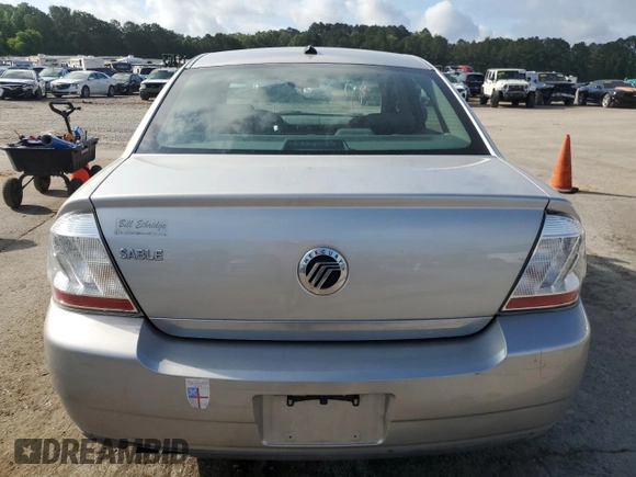 2008 Mercury Sable with VIN 1MEHM40W38G621379, listed as a Copart auction lot 54855085 with 107,443 mi miles and Salvage title. Bid and sale history available at DreamBid. Image 6.