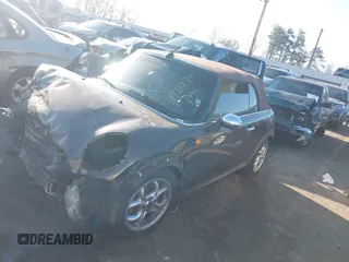 2011 MINI Convertible with VIN WMWZN3C55BT133367, listed as a IAAI auction lot 41781374 with 124,036 mi miles and . Bid and sale history available at DreamBid. Image 17.