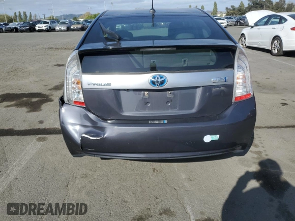 2013 Toyota Prius z VIN JTDKN3DP6D3033253, wystawiony jako Copart lot #53166025 z przebiegiem 169 319 mil mil oraz Nie do naprawy • Non repairable. Historia ofert i sprzedaży dostępna na DreamBid. Obrazek 6.