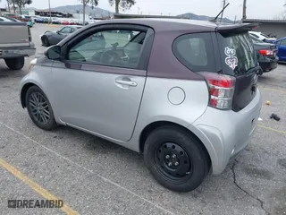 2014 Scion iQ with VIN JTNJJXB01EJ028930, listed as a IAAI auction lot 41771879 with 113,364 mi miles. Bid and sale history available at carsss.com. Image 3.