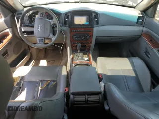 2005 Jeep Grand Cherokee Limited with VIN 1J8HR58265C699077, listed as a Copart auction lot 58490185 with 163,280 mi miles and Salvage title. Bid and sale history available at DreamBid. Image 8.