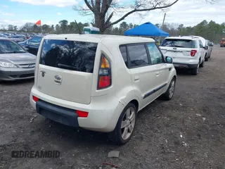 2010 Kia Soul + with VIN KNDJT2A2XA7034348, listed as a IAAI auction lot 42059954 with 252,878 mi miles. Bid and sale history available at carsss.com. Image 4.