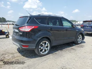 2015 Ford Escape Titanium with VIN 1FMCU0JX7FUA87129, listed as a Copart auction lot 61846965 with 160,044 mi miles and Salvage title. Bid and sale history available at DreamBid. Image 3.