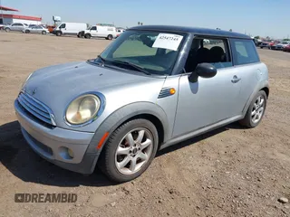2007 MINI Hardtop with VIN WMWMF33547TL77235, listed as a IAAI auction lot 42547245 with 144,179 mi miles and . Bid and sale history available at DreamBid. Image 2.