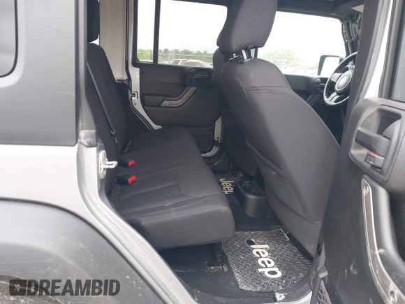 2013 Jeep Wrangler Unlimited Sport z VIN 1C4BJWDG3DL669593, wystawiony jako IAAI lot #42161265 z przebiegiem 89 747 mil mil oraz . Historia ofert i sprzedaży dostępna na DreamBid. Obrazek 8.