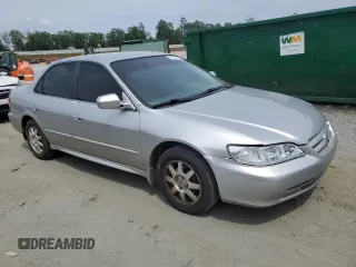 2001 Honda Accord LX z VIN 1HGCG564X1A135855, wystawiony jako Copart lot #57346815 z przebiegiem 235 585 mil mil oraz Szkoda całkowita • Salvage title. Historia ofert i sprzedaży dostępna na DreamBid. Obrazek 4.
