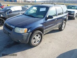 2003 Ford Escape XLT Popular 2 with VIN 1FMYU93103KE17610, listed as a IAAI auction lot 41766806 with 1 mi miles. Bid and sale history available at carsss.com. Image 2.