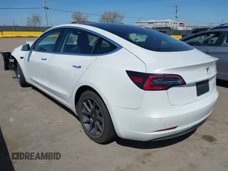 2020 Tesla Model 3 Long Range with VIN 5YJ3E1EB4LF619754, listed as a IAAI auction lot 41920422 with 82,430 mi miles and . Bid and sale history available at DreamBid. Image 3.