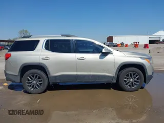 2017 GMC Acadia SLT z VIN 1GKKNMLS6HZ134084, wystawiony jako IAAI lot #41978517 z przebiegiem 157 680 mil mil oraz . Historia ofert i sprzedaży dostępna na DreamBid. Obrazek 13.