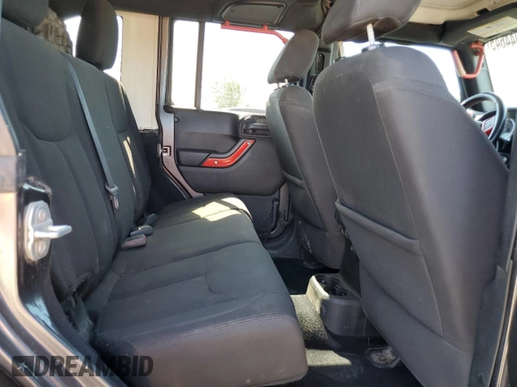 2016 Jeep Wrangler Unlimited Freedom with VIN 1C4BJWDG8GL300314, listed as a Copart auction lot 61044645 with 103,396 mi miles and Clean title. Bid and sale history available at DreamBid. Image 11.