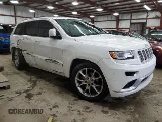 2015 Jeep Grand Cherokee Summit with VIN 1C4RJFJG9FC794992, listed as a Copart auction lot 42790355 with 74,044 mi miles and Salvage Title. Bid and sale history available at DreamBid. Image 4.