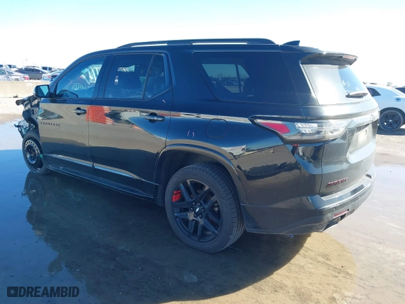2019 Chevrolet Traverse Premier with VIN 1GNEVKKWXKJ142249, listed as a IAAI auction lot 41194959 with 101,566 mi miles. Bid and sale history available at carsss.com. Image 3.