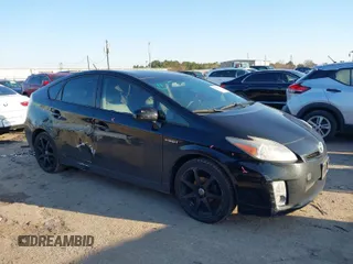 2011 Toyota Prius I with VIN JTDKN3DUXB0293692, listed as a IAAI auction lot 41628333 with 124,577 mi miles. Bid and sale history available at carsss.com. Image 1.
