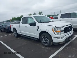 2021 Ford F-150 XL with VIN 1FTEX1C51MFD08456, listed as a IAAI auction lot 42220056 with 52,437 mi miles and . Bid and sale history available at DreamBid. Image 1.