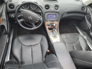 2008 Mercedes-Benz SL 550 with VIN WDBSK71FX8F141468, listed as a Copart auction lot 61036285 with 109,698 mi miles and Salvage title. Bid and sale history available at DreamBid. Image 8.