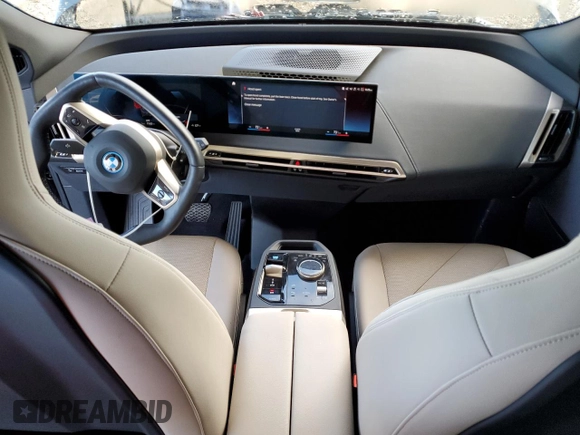 2023 BMW iX xDrive50 with VIN WB523CF06PCM05213, listed as a Copart auction lot 43619624 with 11,863 mi miles. Bid and sale history available at carsss.com. Image 8.