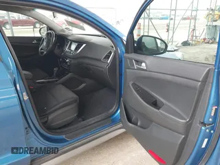 2018 Hyundai Tucson Sport with VIN KM8J33AL0JU803368, listed as a IAAI auction lot 41937235 with 64,163 mi miles and . Bid and sale history available at DreamBid. Image 5.