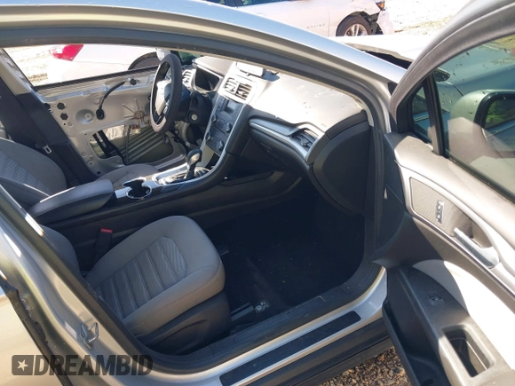 2016 Ford Fusion S z VIN 3FA6P0G76GR377005, wystawiony jako IAAI lot #42006585 z przebiegiem 100 575 mil mil oraz . Historia ofert i sprzedaży dostępna na DreamBid. Obrazek 5.