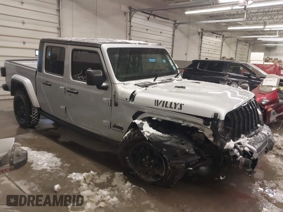 2023 Jeep Gladiator Sport S с VIN 1C6HJTAG1PL558131, выставлен на аукционе IAAI как лот 41252271 с пробегом 42 582 миль миль и . История ставок и продаж доступна на DreamBid. Изображение 1.