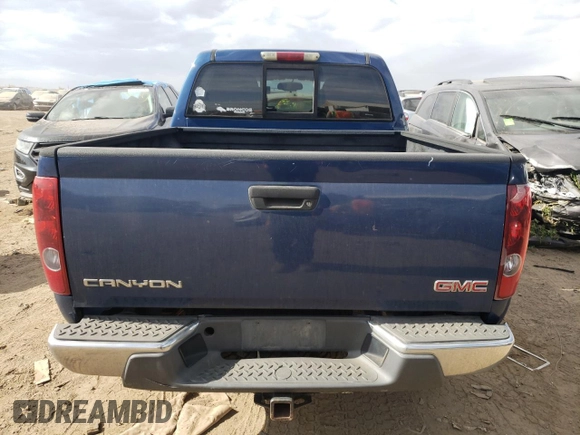 2006 GMC Canyon SLE2 with VIN 1GTDT136968311810, listed as a Copart auction lot 77146164 with 243,109 mi miles and Salvage Title. Bid and sale history available at carsss.com. Image 6.