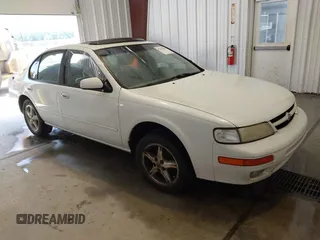 1997 Nissan Maxima GXE z VIN JN1CA21D4VT215672, wystawiony jako IAAI lot #42479487 z przebiegiem 257 178 mil mil oraz . Historia ofert i sprzedaży dostępna na DreamBid. Obrazek 1.