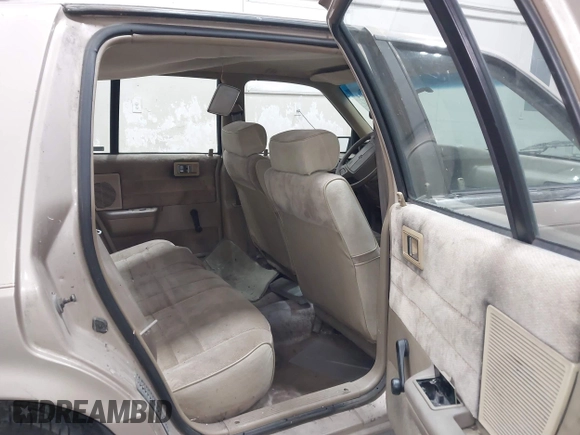 1991 Dodge Spirit z VIN 1B3XA46KXMF519542, wystawiony jako IAAI lot #42278204 z przebiegiem 134 919 mil mil oraz . Historia ofert i sprzedaży dostępna na DreamBid. Obrazek 8.