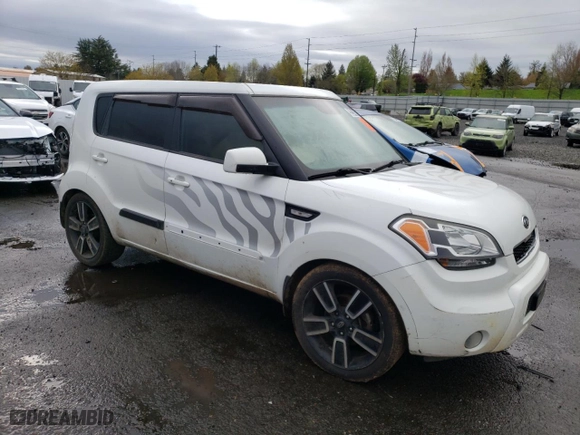 2011 Kia Soul + with VIN KNDJT2A21B7262871, listed as a Copart auction lot 52214145 with 239,808 mi miles and Clean Title. Bid and sale history available at carsss.com. Image 4.