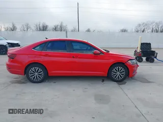 2019 Volkswagen Jetta S z VIN 3VWC57BUXKM099060, wystawiony jako IAAI lot #41478697 z przebiegiem 134 363 mil mil oraz . Historia ofert i sprzedaży dostępna na DreamBid. Obrazek 12.