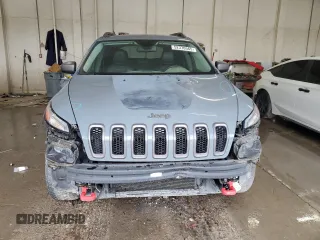 2014 Jeep Cherokee Trailhawk z VIN 1C4PJMBB0EW309277, wystawiony jako Copart lot #52370565 z przebiegiem 148 924 mil mil oraz Czysty tytuł • Clean title. Historia ofert i sprzedaży dostępna na DreamBid. Obrazek 5.