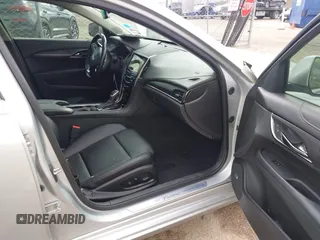 2018 Cadillac ATS RWD z VIN 1G6AA5RX5J0178702, wystawiony jako IAAI lot #41522724 z przebiegiem 79 502 mil mil oraz . Historia ofert i sprzedaży dostępna na DreamBid. Obrazek 5.
