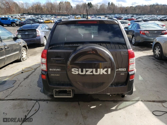 2013 Suzuki Grand Vitara Limited with VIN JS3TD0D71D4100584, listed as a Copart auction lot 79908214 with 129,543 mi miles and Salvage Title. Bid and sale history available at carsss.com. Image 6.