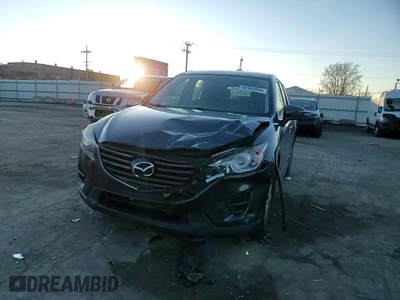 2016 Mazda CX-5 Sport with VIN JM3KE2BY9G0771969, listed as a Copart auction lot 80966064 with 99,348 mi miles and Salvage title. Bid and sale history available at DreamBid. Image 11.